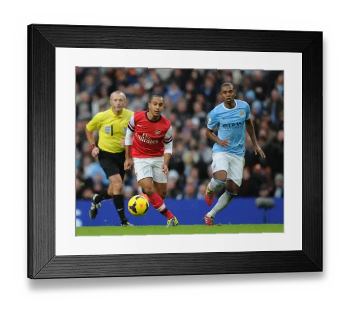 Framed Print : Theo Walcott vs Fernandinho: Battle at the Etihad - Manchester City vs Arsenal (2013-14)