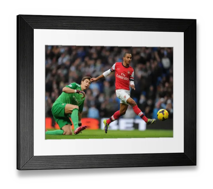 Framed Print : Theo Walcott Outmaneuvers Costel Pantilimon: Manchester City vs. Arsenal, Premier League, 2013 Framed Print : Theo Walcott Outmaneuvers Costel Pantilimon: Manchester City vs. Arsenal, Premier League, 2013