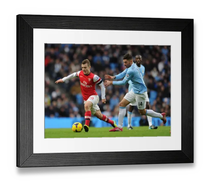 Framed Print : Clash of Midfield Titans: Wilshere vs. Garcia - Manchester City vs. Arsenal, Premier League 2013-14 Framed Print : Clash of Midfield Titans: Wilshere vs. Garcia - Manchester City vs. Arsenal, Premier League 2013-14