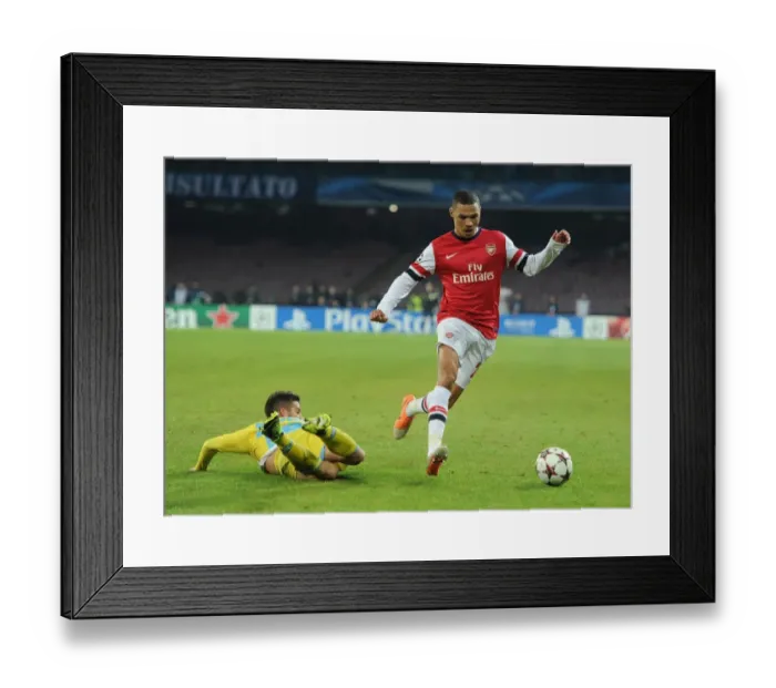 Framed Print : Arsenal's Kieran Gibbs Outmaneuvers Napoli's Dries Mertens in UEFA Champions League Clash