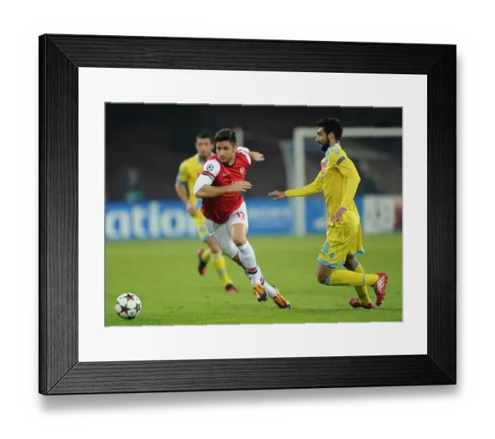 Framed Print : Olivier Giroud Outmaneuvers Raul Albiol in Napoli vs. Arsenal UEFA Champions League Clash Framed Print : Olivier Giroud Outmaneuvers Raul Albiol in Napoli vs. Arsenal UEFA Champions League Clash
