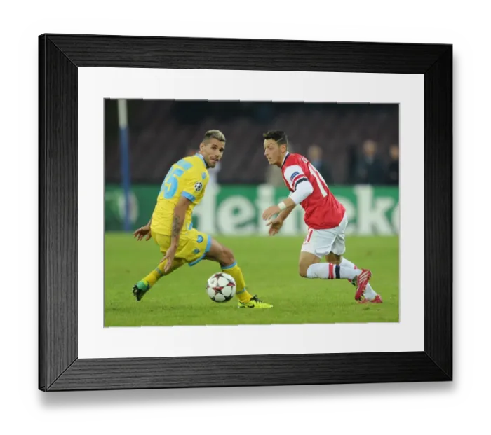 Framed Print : Mesut Ozil vs Valon Behrami: A Champions League Battle at Stadio San Paolo Framed Print : Mesut Ozil vs Valon Behrami: A Champions League Battle at Stadio San Paolo