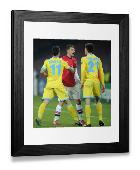 Framed Print : Clash in Naples: Ramsey vs. Maggio & Fernandez (Napoli v Arsenal, UEFA Champions League)