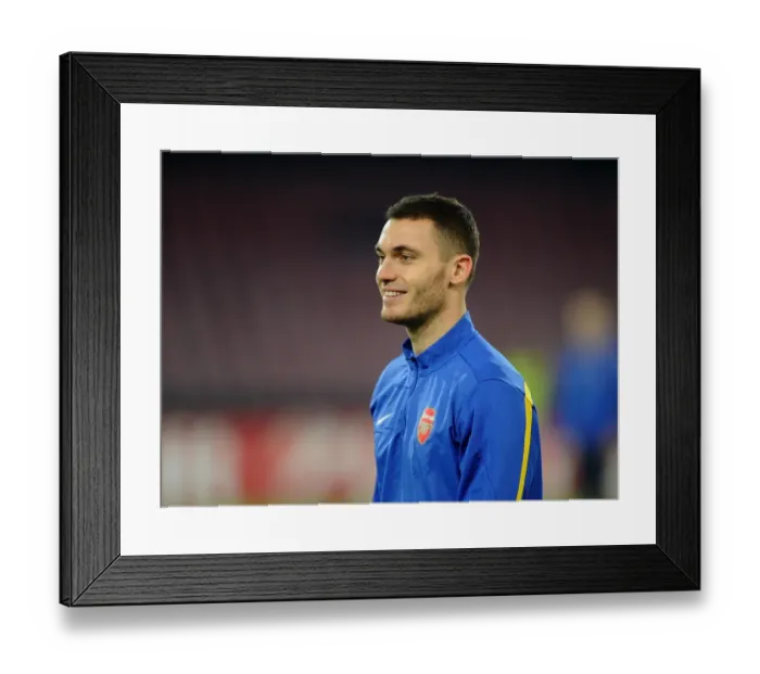 Framed Print : Thomas Vermaelen at Napoli's Stadio San Paolo during Arsenal's UEFA Champions League Match (2013)