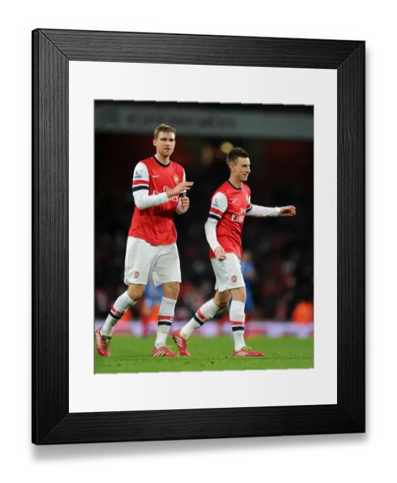 Framed Print : Arsenal's Mertesacker and Koscielny Celebrate Victory Over Hull City Framed Print : Arsenal's Mertesacker and Koscielny Celebrate Victory Over Hull City