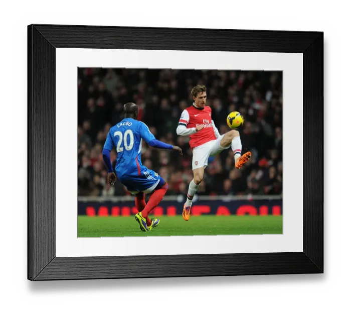 Framed Print : Monreal vs Sagbo: Intense Battle at Emirates Stadium - Arsenal v Hull City, 2013-14 Premier League