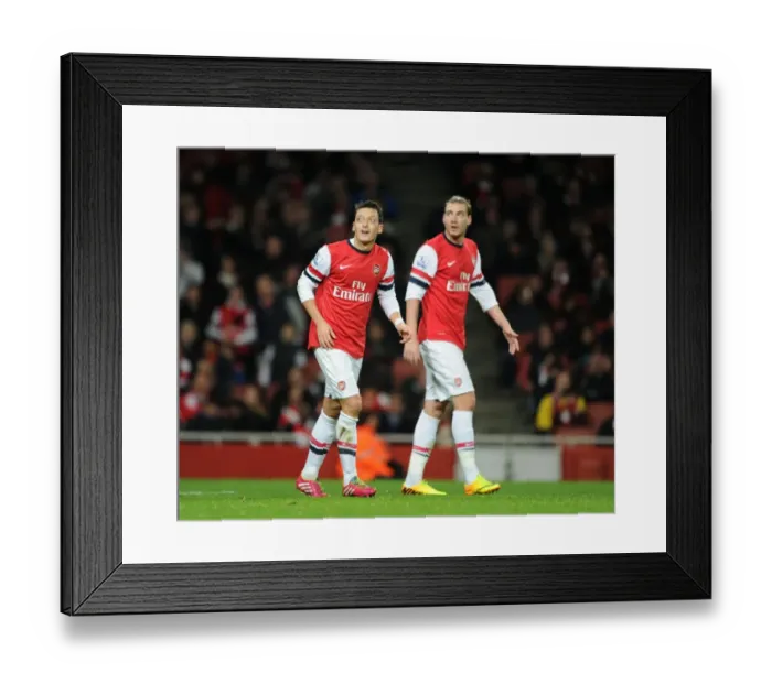 Framed Print : Arsenal: Ozil and Bendtner in Action against Hull City, Premier League 2013-14