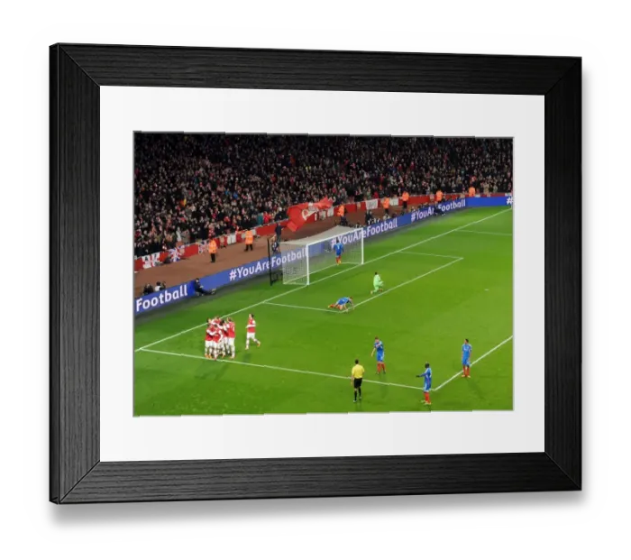 Framed Print : Mesut Ozil Scores Arsenal's Second Goal Against Hull City (2013-14) Framed Print : Mesut Ozil Scores Arsenal's Second Goal Against Hull City (2013-14)