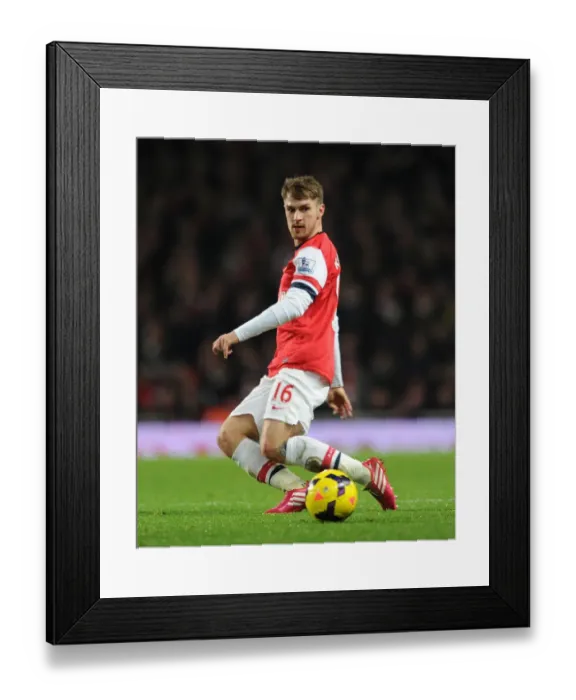 Framed Print : Aaron Ramsey in Action: Arsenal vs Hull City, Premier League 2013-14