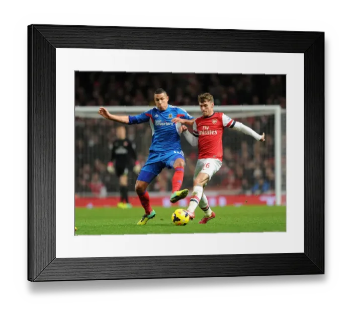 Framed Print : Arsenal's Ramsey Faces Off Against Hull's Livermore in Premier League Clash Framed Print : Arsenal's Ramsey Faces Off Against Hull's Livermore in Premier League Clash