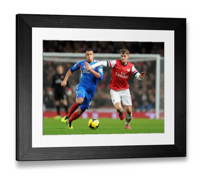 Framed Print : Ramsey vs. Livermore: A Battle of Intense Determination in Arsenal's Clash Against Hull (2013-14) Framed Print : Ramsey vs. Livermore: A Battle of Intense Determination in Arsenal's Clash Against Hull (2013-14)