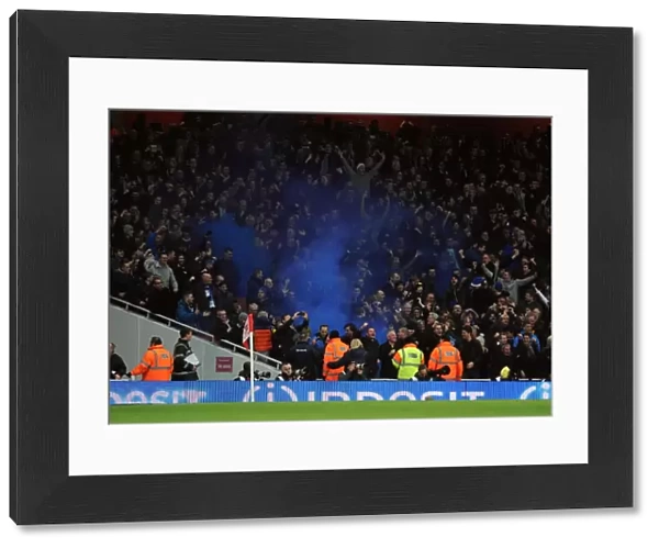 Everton fans let off a blue flare. Arsenal 1: 1 Everton. Barclays Premier League. Emirates Stadium
