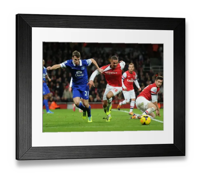 Framed Print : Intense Rivalry: Gibbs vs. Coleman in Arsenal v Everton Premier League Clash