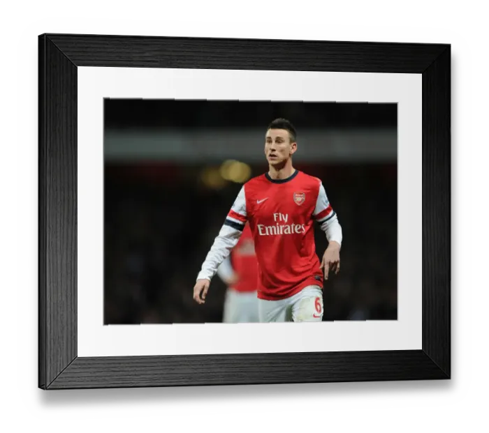 Framed Print : Arsenal's Laurent Koscielny in Action against Everton (2013-14)