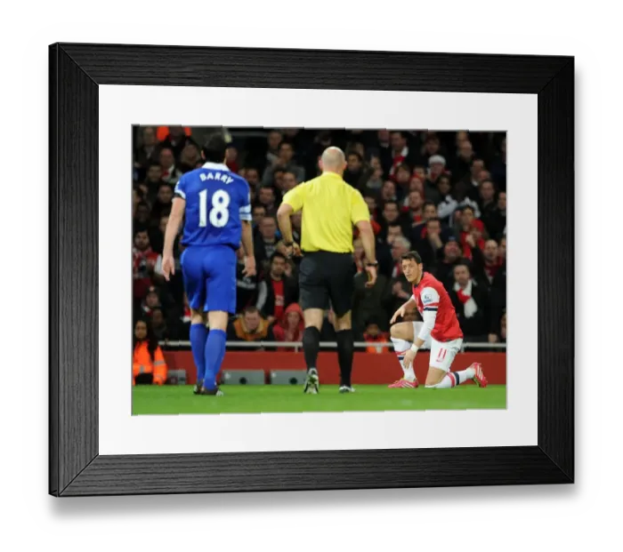 Framed Print : Mesut Ozil and Gareth Barry in Intense Moment during Arsenal vs Everton, Premier League, 2013