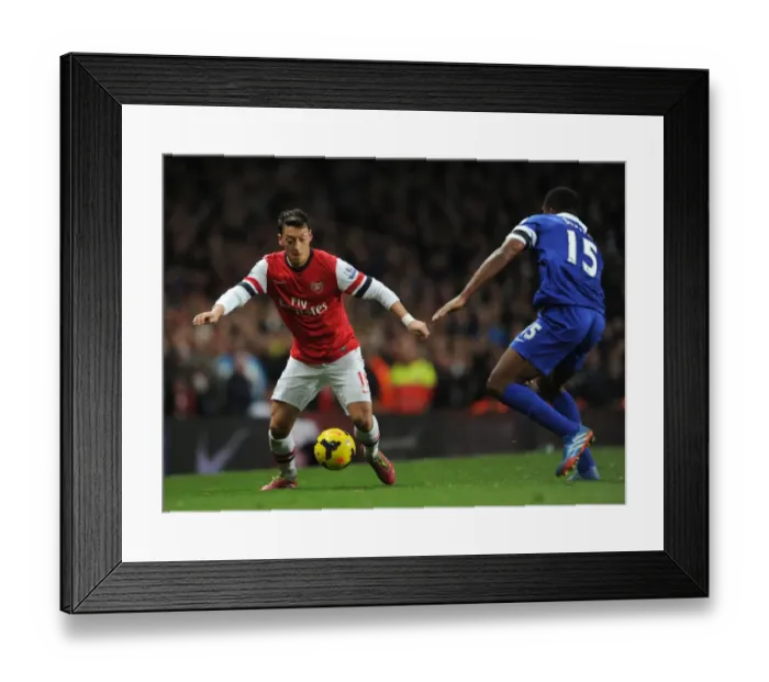 Framed Print : Mesut Ozil Clashes with Sylvain Distin: Arsenal vs Everton, Premier League 2013-14