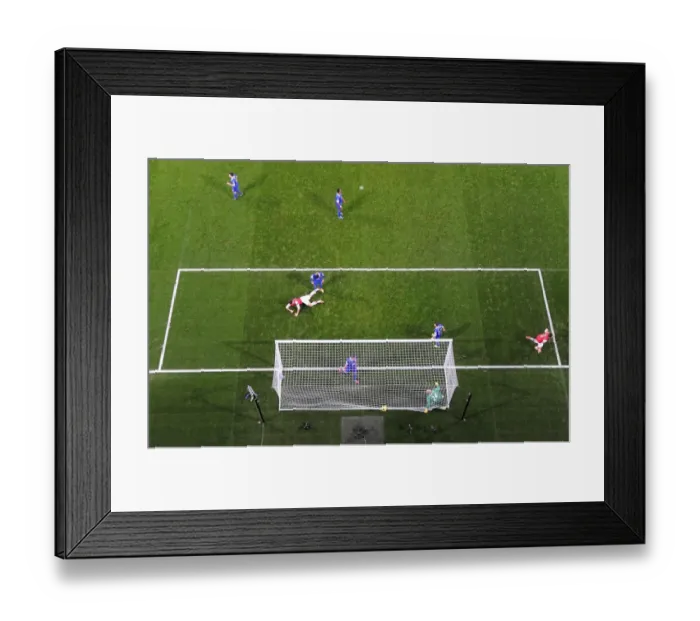 Framed Print : Mesut Ozil celebrates scoring Arsenals goal. Arsenal 1: 1 Everton. Barclays Premier League
