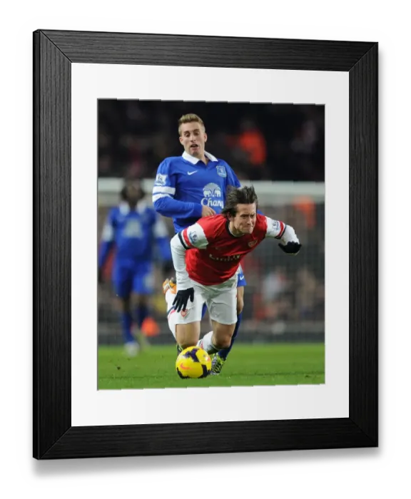 Framed Print : Arsenal vs. Everton: Rosicky vs. Delofeu - Intense Battle in the Premier League