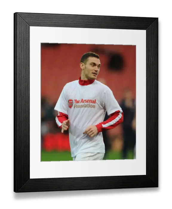 Framed Print : Thomas Vermaelen (Arsenal) warms up in his Arsenal Foundation T Shirt before the match Framed Print : Thomas Vermaelen (Arsenal) warms up in his Arsenal Foundation T Shirt before the match
