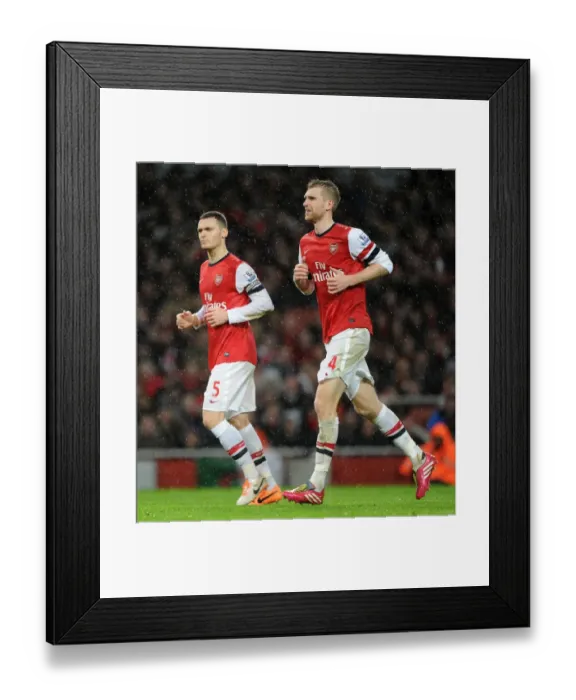 Framed Print : Arsenal's Defensive Duo: Vermaelen and Mertesacker in Action (Arsenal vs. Chelsea, 2013-14)