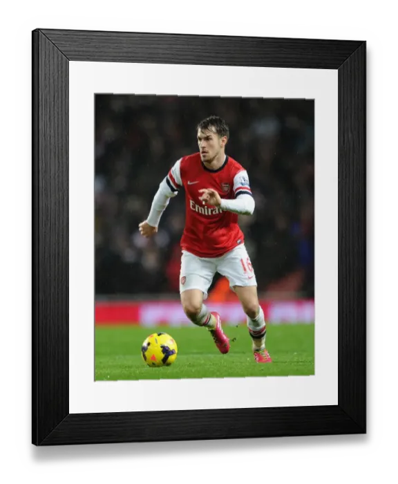 Framed Print : Arsenal's Aaron Ramsey Fights for Possession against Chelsea in Premier League Clash (2013-14) Framed Print : Arsenal's Aaron Ramsey Fights for Possession against Chelsea in Premier League Clash (2013-14)