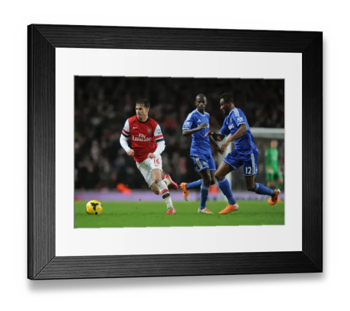 Framed Print : Arsenal's Aaron Ramsey Clashes with Chelsea's John Obi Mikel in Premier League Showdown Framed Print : Arsenal's Aaron Ramsey Clashes with Chelsea's John Obi Mikel in Premier League Showdown