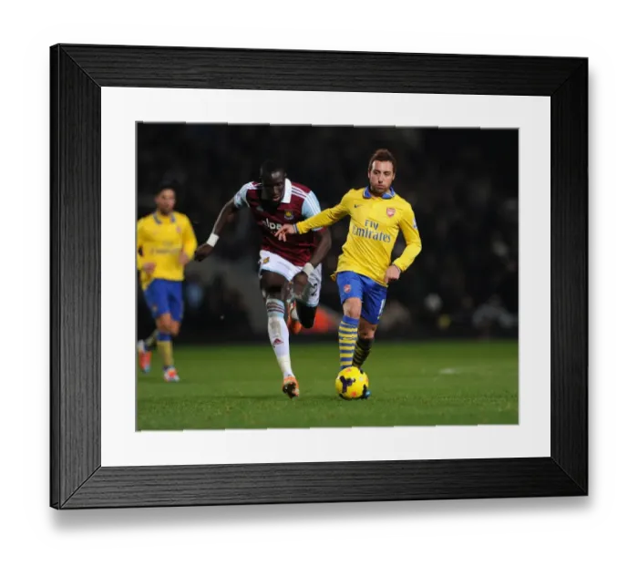 Framed Print : Santi Cazorla Dashes Past Mohamed Diame: Arsenal vs. West Ham United, Premier League (December 2013) Framed Print : Santi Cazorla Dashes Past Mohamed Diame: Arsenal vs. West Ham United, Premier League (December 2013)