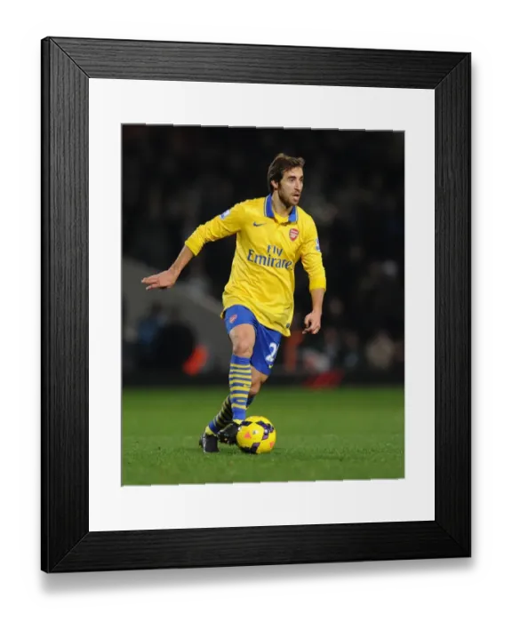 Framed Print : Arsenal's Mathew Flamini in Action: Premier League Battle against West Ham United (December 2013)
