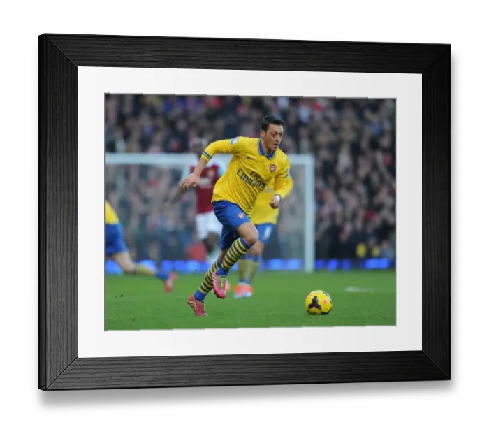 Framed Print : Mesut Ozil Shines in Arsenal's 3-1 Barclays Premier League Victory over West Ham United at Upton Park (December 2013) Framed Print : Mesut Ozil Shines in Arsenal's 3-1 Barclays Premier League Victory over West Ham United at Upton Park (December 2013)