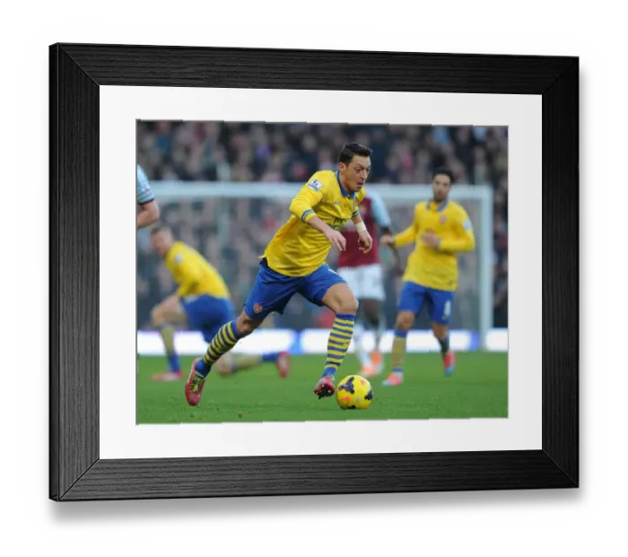 Framed Print : Mesut Ozil (Arsenal). West Ham United 1: 3 Arsenal. Barclays Premier League. The Boleyn Ground