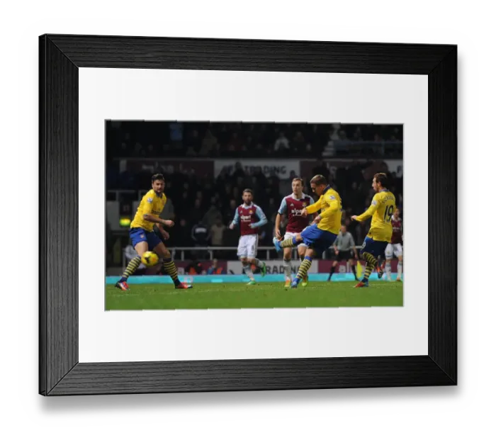 Framed Print : Lukas Podolski Scores the Third Goal: West Ham United vs. Arsenal, Premier League 2013-14 Framed Print : Lukas Podolski Scores the Third Goal: West Ham United vs. Arsenal, Premier League 2013-14