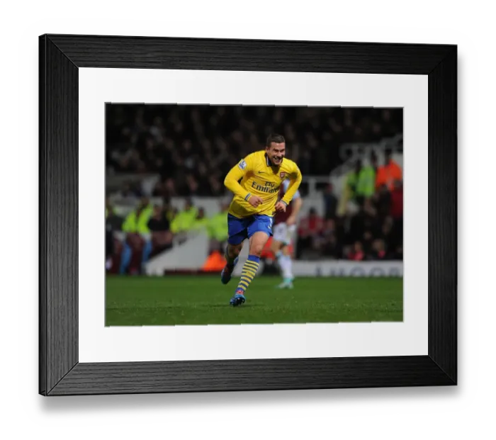 Framed Print : Podolski's Hat-Trick: Arsenal's Dominant Performance Against West Ham United (December 2013)