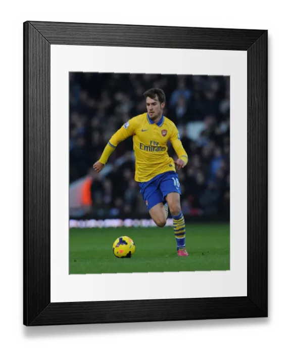 Framed Print : Aaron Ramsey in Action: West Ham United vs. Arsenal, Premier League (December 2013) Framed Print : Aaron Ramsey in Action: West Ham United vs. Arsenal, Premier League (December 2013)