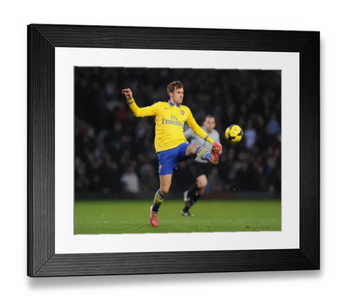 Framed Print : Aaron Ramsey in Action: West Ham United vs Arsenal, Premier League 2013-14 Framed Print : Aaron Ramsey in Action: West Ham United vs Arsenal, Premier League 2013-14
