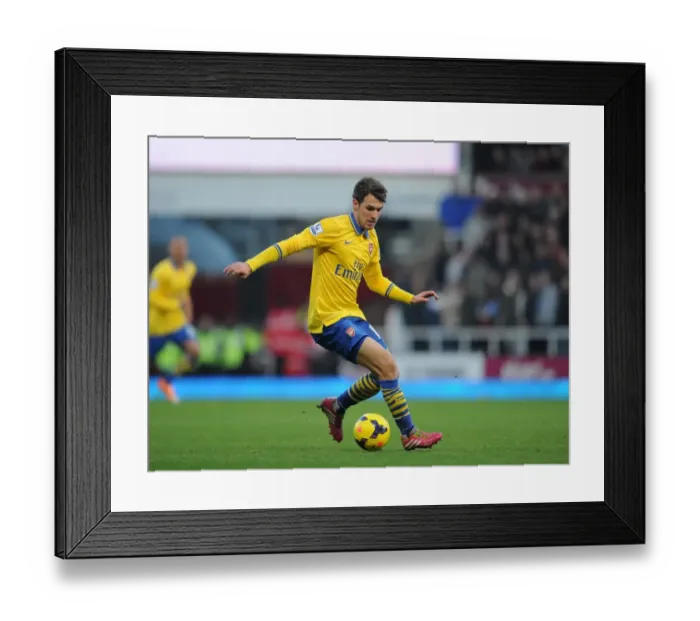 Framed Print : Aaron Ramsey (Arsenal). West Ham United 1: 3 Arsenal. Barclays Premier League. The Boleyn Ground Framed Print : Aaron Ramsey (Arsenal). West Ham United 1: 3 Arsenal. Barclays Premier League. The Boleyn Ground