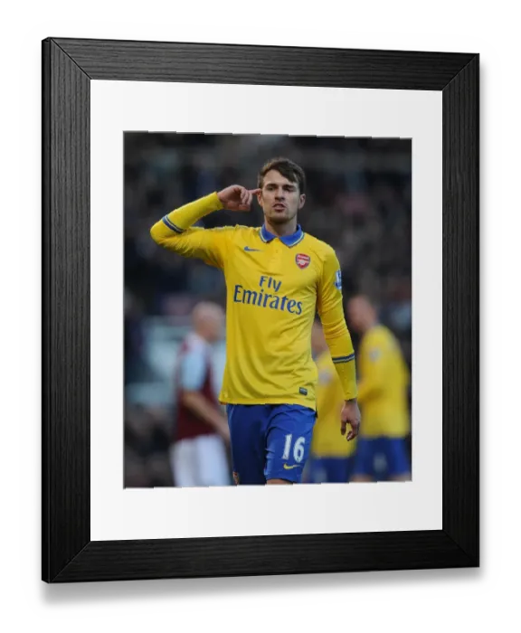 Framed Print : Aaron Ramsey in Action: Arsenal vs West Ham United, Premier League 2013-14 Framed Print : Aaron Ramsey in Action: Arsenal vs West Ham United, Premier League 2013-14