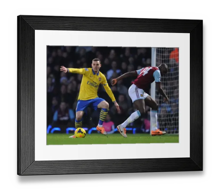 Framed Print : Thomas Vermaelen (Arsenal) Carlton Cole (West Ham). West Ham United 1: 3 Arsenal