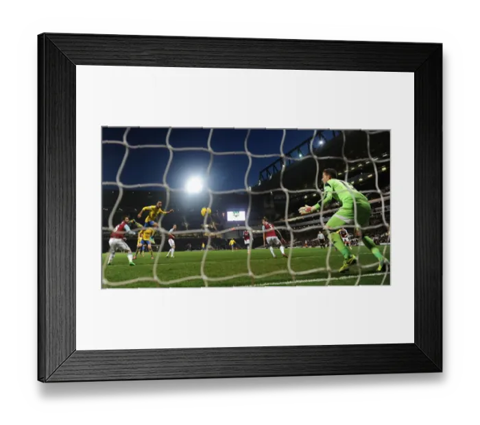 Framed Print : Theo Walcott Scores Brace: Arsenal Triumphs Over West Ham United in Premier League Clash, December 2013