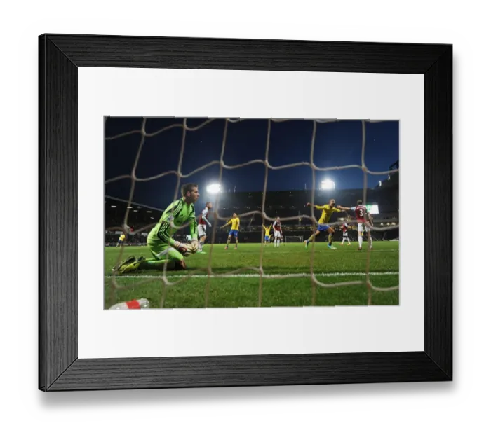 Framed Print : Theo Walcott's Double Strike: Celebrating at the Expense of Disappointed Adrian (West Ham vs Arsenal, 2013-14)