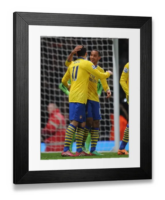 Framed Print : Theo Walcott and Mesut Ozil's Stunning Goals: West Ham United vs. Arsenal (2013-14) Framed Print : Theo Walcott and Mesut Ozil's Stunning Goals: West Ham United vs. Arsenal (2013-14)