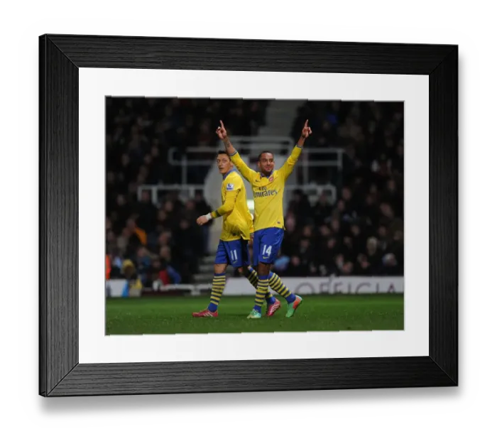 Framed Print : Theo Walcott's Double: Arsenal's Triumph over West Ham United in the Premier League (December 2013) Framed Print : Theo Walcott's Double: Arsenal's Triumph over West Ham United in the Premier League (December 2013)