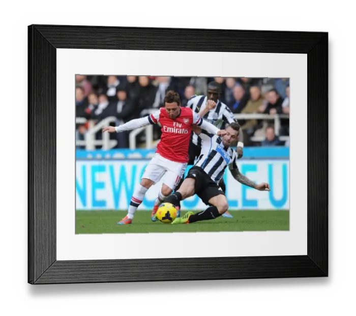 Framed Print : Clash of Talents: Cazorla vs Debuchy in Newcastle vs Arsenal Premier League Showdown Framed Print : Clash of Talents: Cazorla vs Debuchy in Newcastle vs Arsenal Premier League Showdown