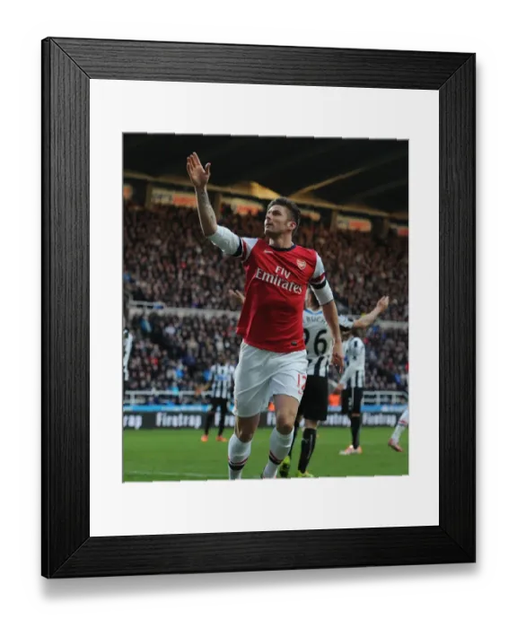 Framed Print : Thrilling Victory: Olivier Giroud's Last-Minute Goal Secures Arsenal's Win at Newcastle United, Premier League 2013-14