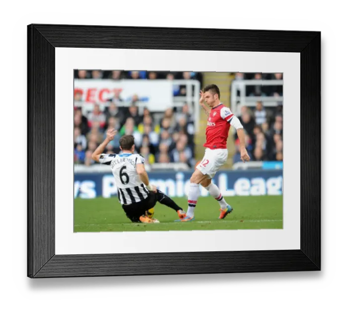 Framed Print : Giroud Foul: Newcastle United vs. Arsenal, Premier League 2013-14 Framed Print : Giroud Foul: Newcastle United vs. Arsenal, Premier League 2013-14