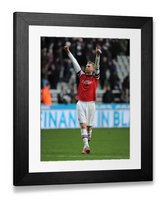Framed Print : Per Mertesacker's Triumphant Moment: Newcastle United vs. Arsenal, Premier League 2013-14 Framed Print : Per Mertesacker's Triumphant Moment: Newcastle United vs. Arsenal, Premier League 2013-14
