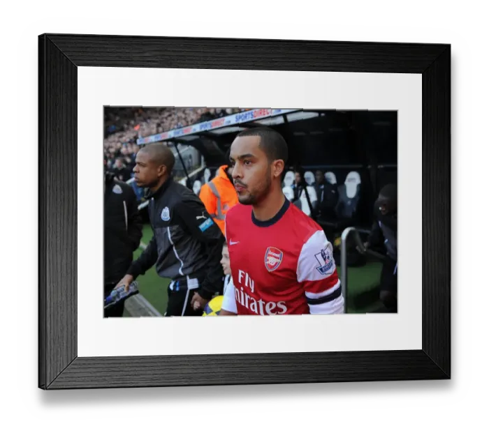 Framed Print : Theo Walcott: Arsenal Star Faces Newcastle United in Premier League Showdown (2013-14)