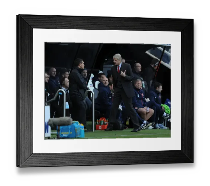 Framed Print : Arsene Wenger and Andre Marriner: A Contentious Interaction at Newcastle-Arsenal Clash (2013-14) Framed Print : Arsene Wenger and Andre Marriner: A Contentious Interaction at Newcastle-Arsenal Clash (2013-14)