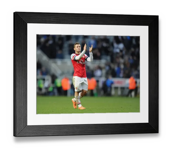 Framed Print : Jack Wilshere's Triumphant Goal Celebration: Arsenal's Victory Over Newcastle United (2013-14) Framed Print : Jack Wilshere's Triumphant Goal Celebration: Arsenal's Victory Over Newcastle United (2013-14)