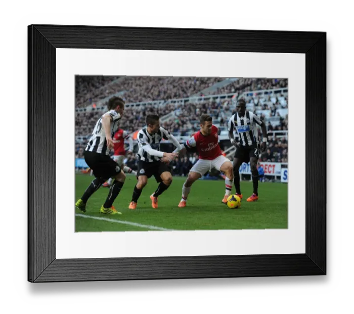 Framed Print : Clash at St. James Park: Wilshere Faces Off Against Newcastle Trio Framed Print : Clash at St. James Park: Wilshere Faces Off Against Newcastle Trio