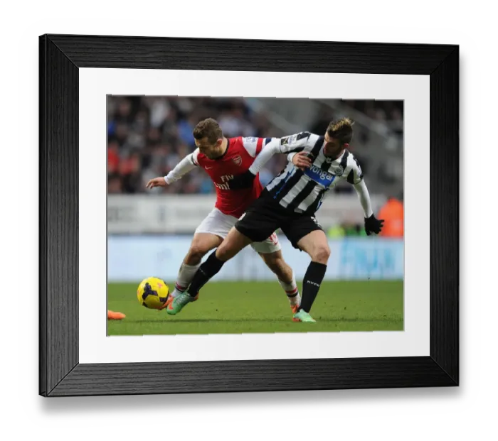 Framed Print : Clash of Talents: Wilshere vs Debuchy - Newcastle United vs Arsenal, Premier League 2013-14